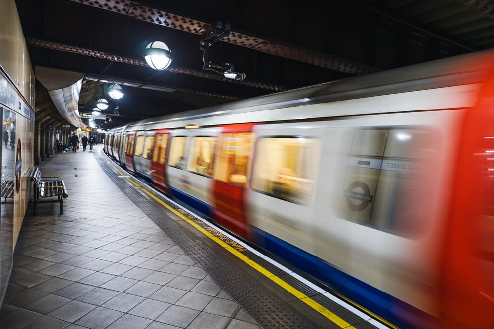 London Underground Train Arriving at Station Platform with Motion Blur